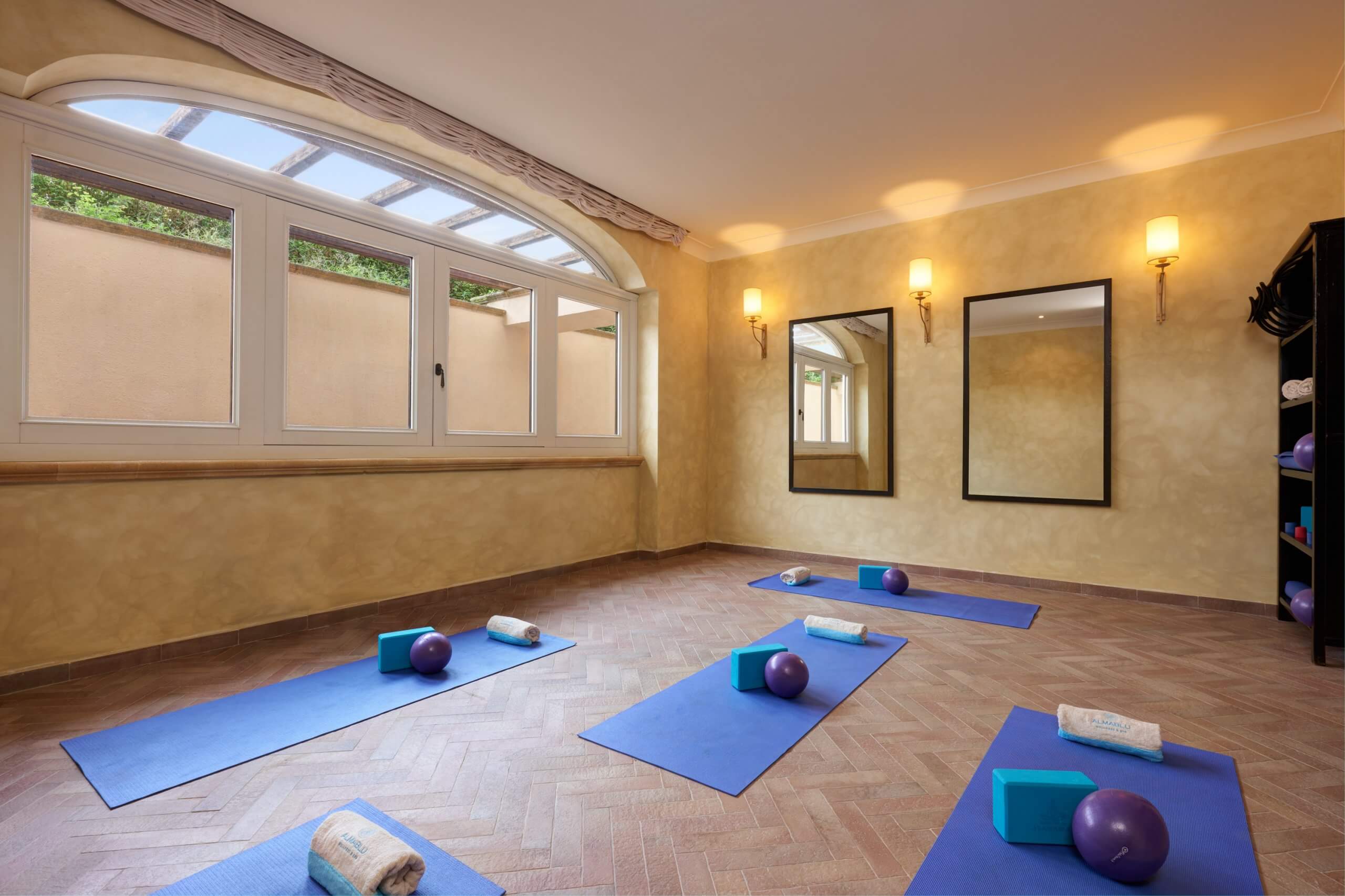 Yoga Lesson Almablu Spa - Almar Giardino di Costanza Resort & Spa